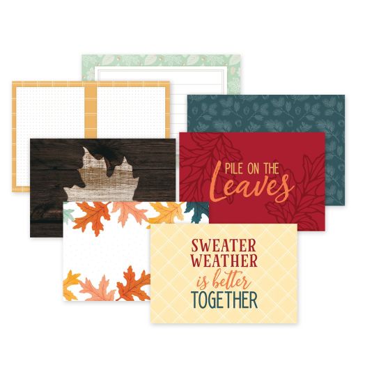Select Golden Harvest Variety Mats on a white background. Designs include fall-themed icons and titles like Pile on the Leaves and Sweater Weather is Better Together.